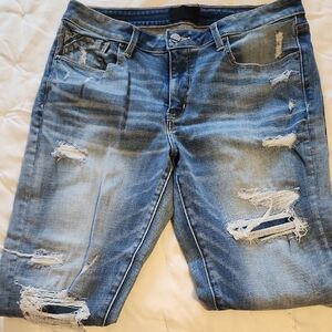 Distressed Blue Jeans